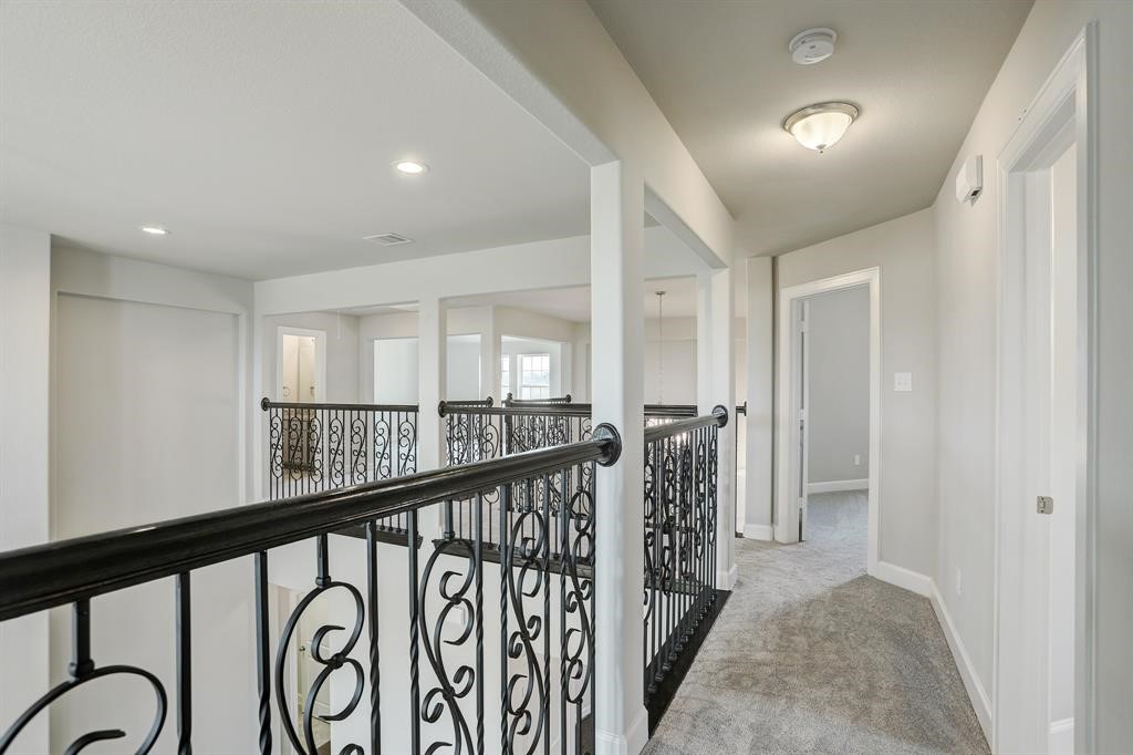 12923 Lott Avenue Houston, TX 77089 - Photo 16 of 23 a view of a hallway with windows