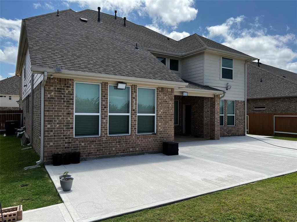 12923 Lott Avenue Houston, TX 77089 - Photo 23 of 23 a front view of a house with a yard