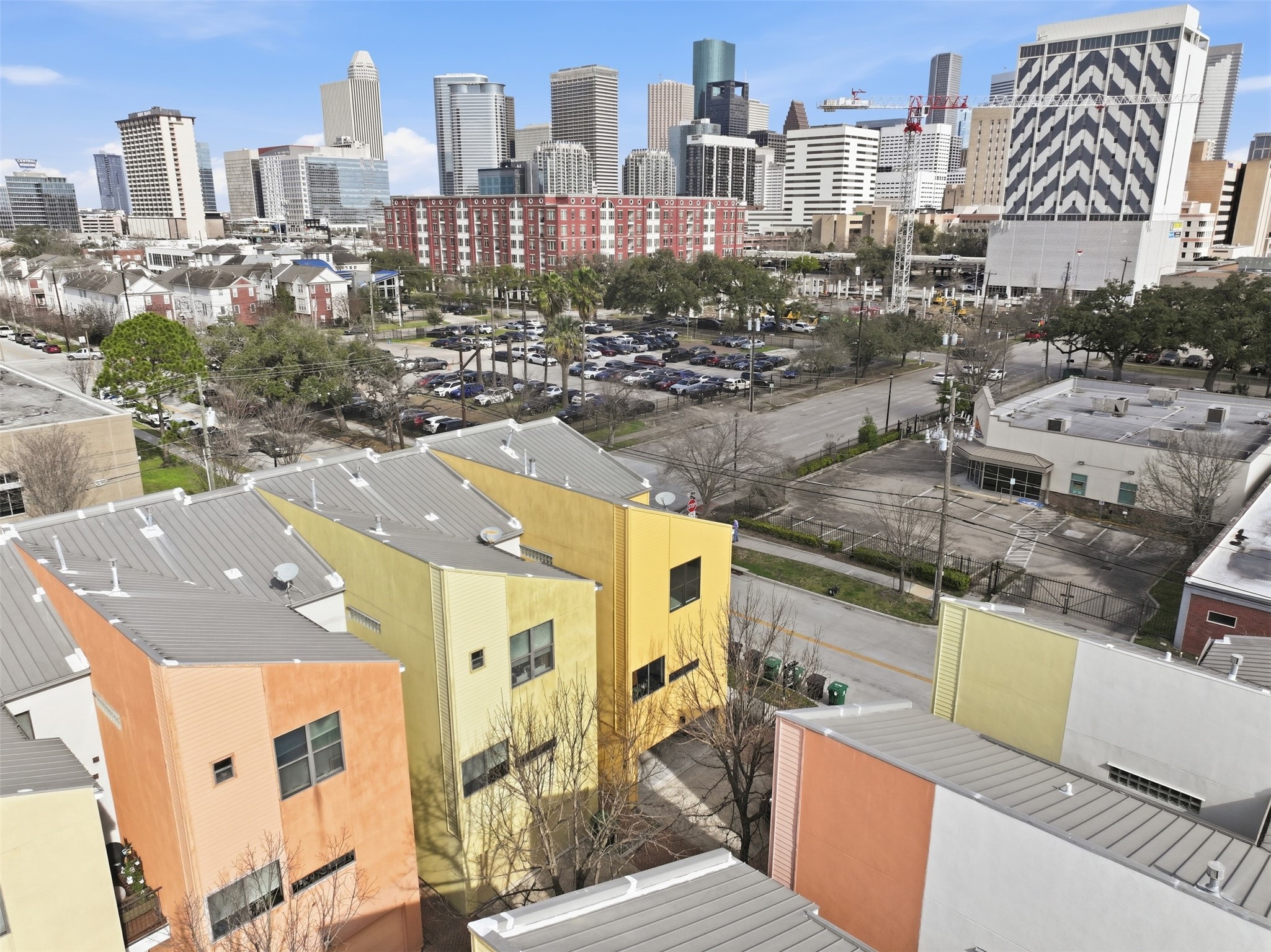 2301 Crawford Street Houston, TX 77004 - Photo 4 of 32 Downtown views! Experience everything this Midtown gem has to offer—ideally located in the heart of Midtown Houston with incredible skyline views and unbeatable walkability. Enjoy easy access to dining, nightlife, parks, and everyday conveniences, all just steps from your front door. This home blends vibrant city living with comfort and style—don’t miss your chance to call it yours!