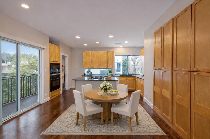 2301 Crawford Street Houston, TX 77004 - Photo 9 of 32 Virtually staged -Located between the kitchen and living area, a private patio offers sweeping city views—delivering all the perks and added privacy of coveted corner-unit living.