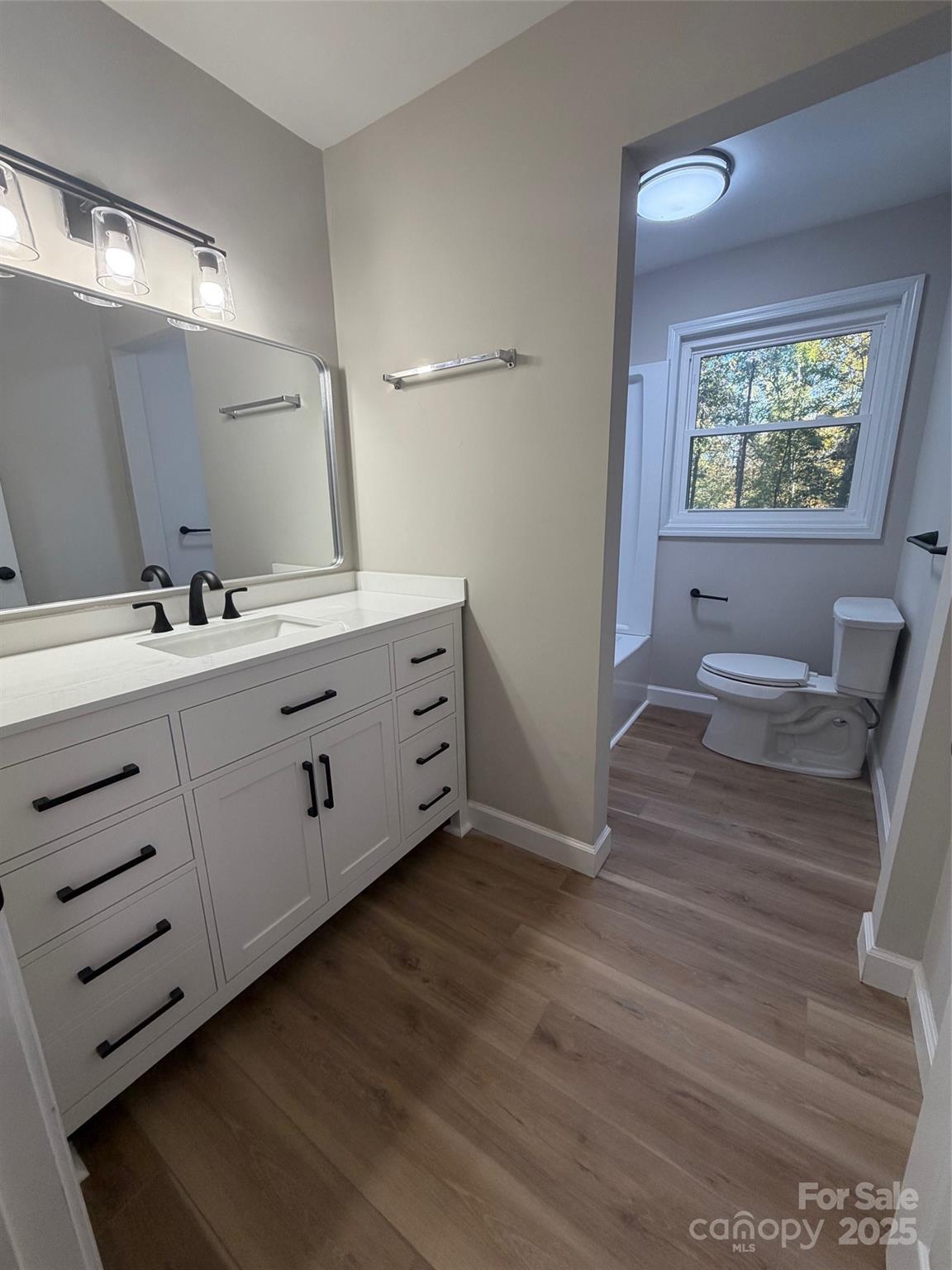 1470 Requa Road Cherryville, NC 28021 - Photo 12 of 28 a room with two mirror and a dresser