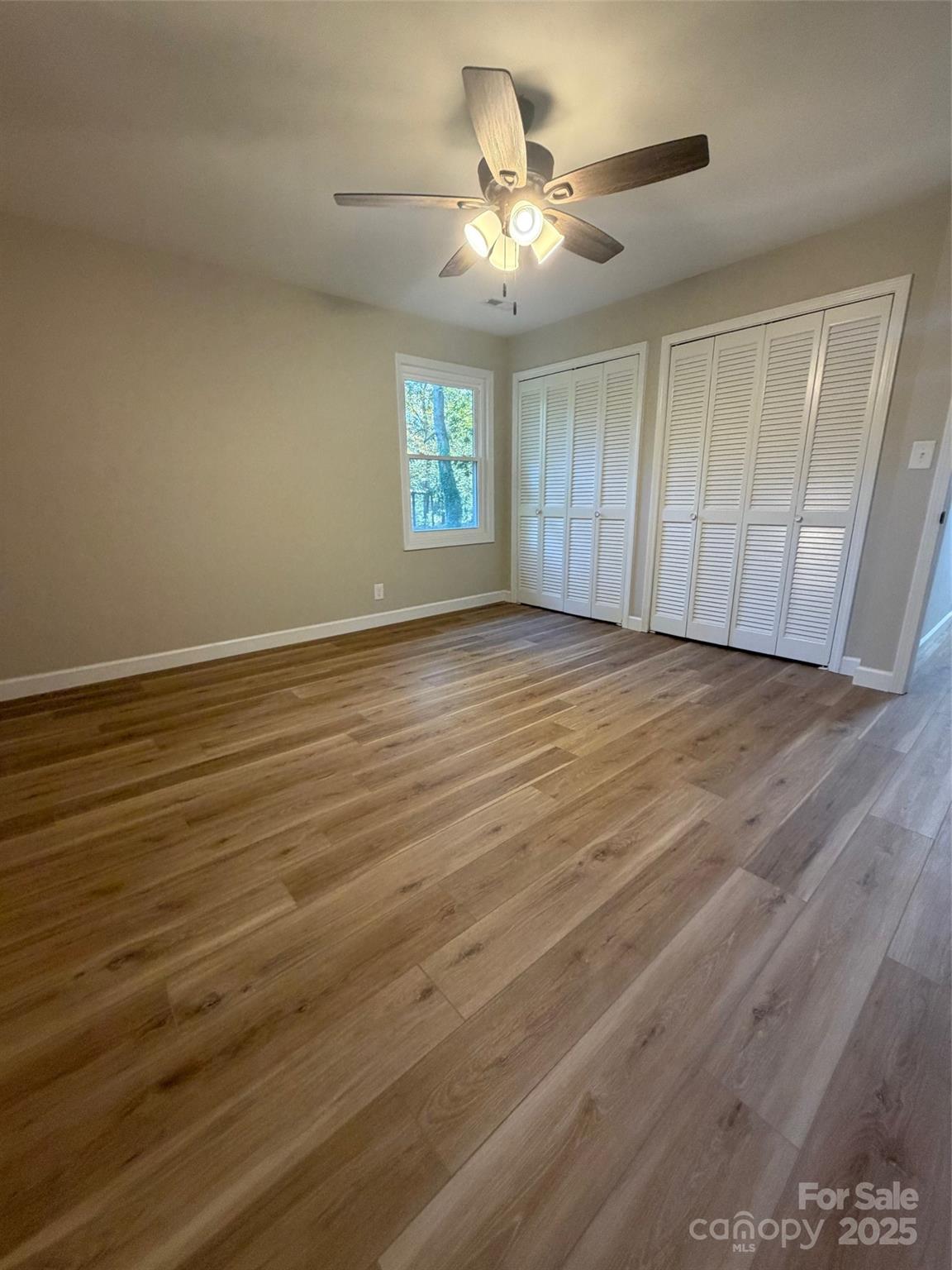 1470 Requa Road Cherryville, NC 28021 - Photo 17 of 28 wooden floor in an empty room with a window