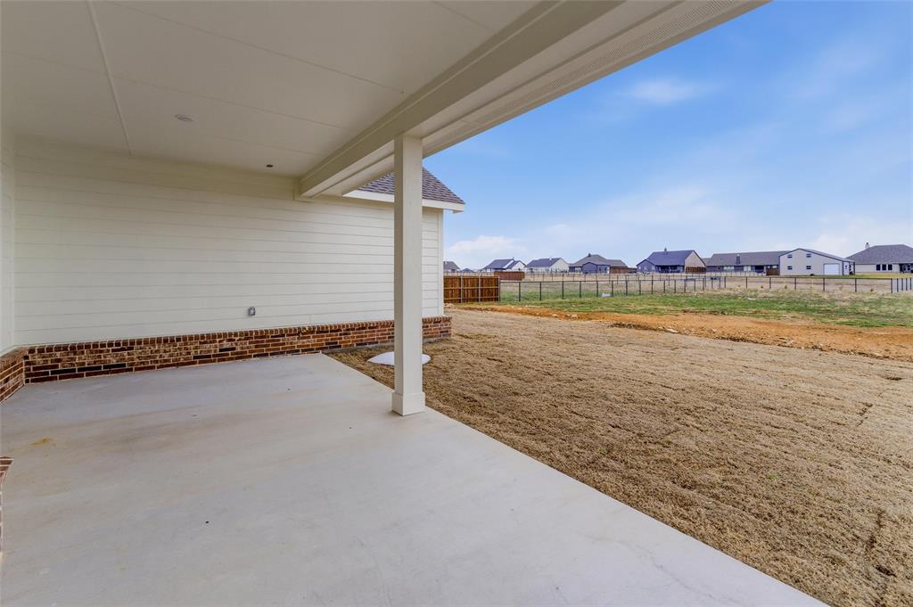 114 Brandywine Trail Rhome, TX 76078 - Photo 5 of 27 a view of a room with an ocean view