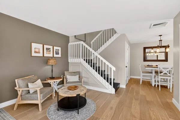 a kitchen with a sink stainless steel appliances and cabinets
