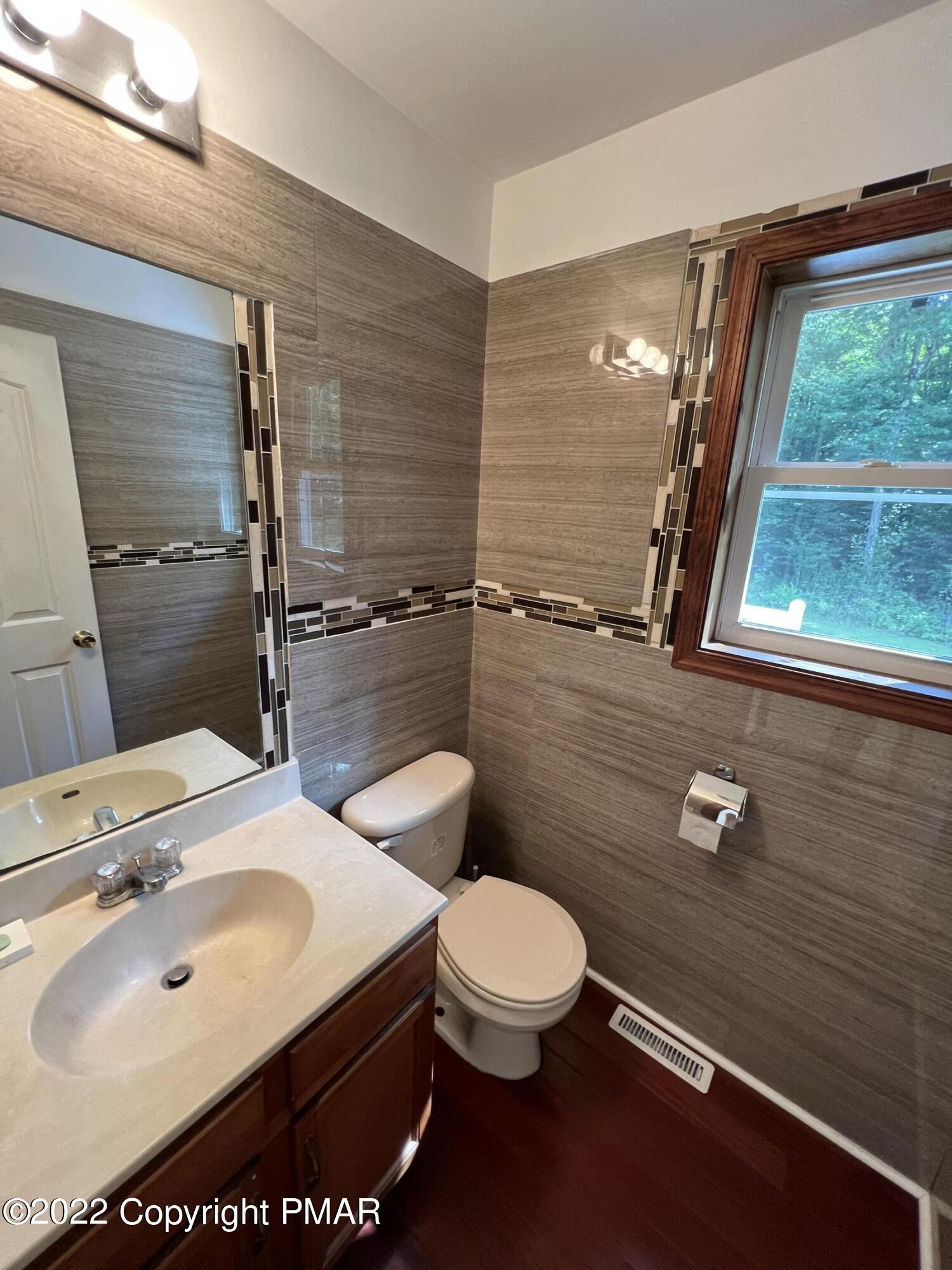 2149 Locust Ridge Road Pocono Lake, PA 18347 - Photo 8 of 24 half bath