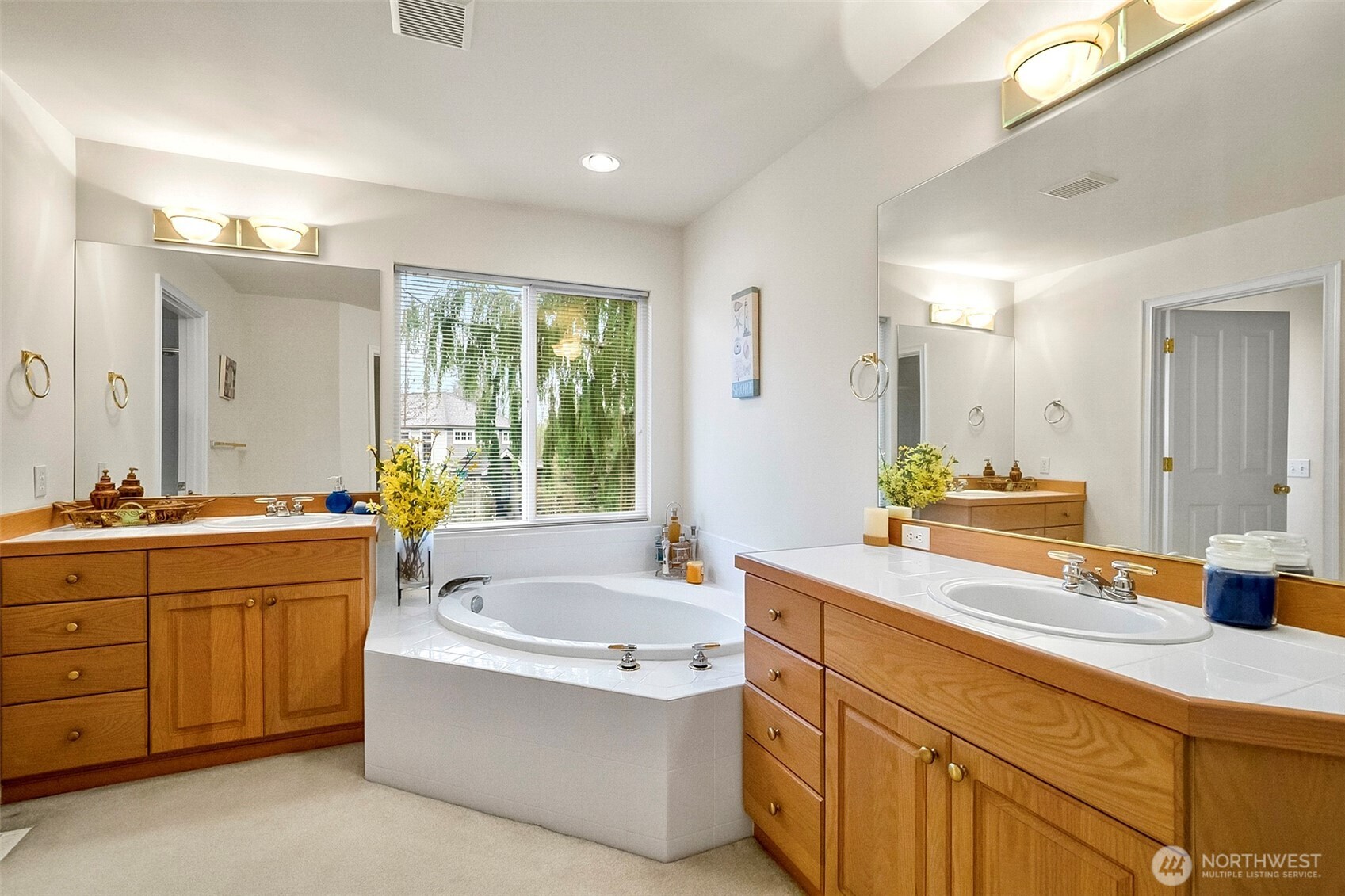 17401 33rd Drive Southeast Bothell, WA 98012 - Photo 26 of 39 a bathroom with a tub sink and mirror