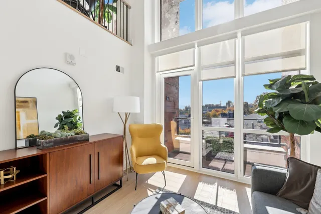 a view of a chairs and table in a room