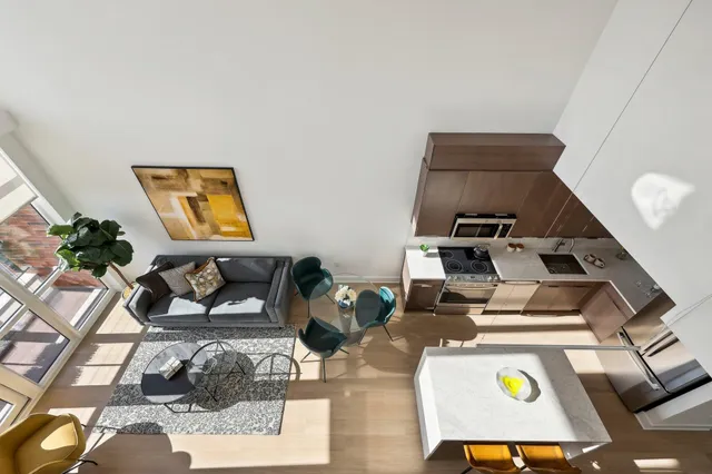 a room with furniture and gym equipment