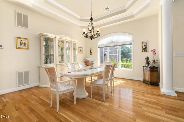 a living room with fireplace furniture and a fireplace