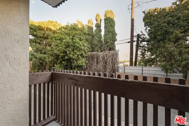 a view of a street from a balcony