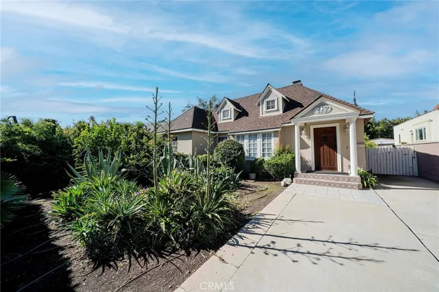 front view of a house with a small yard