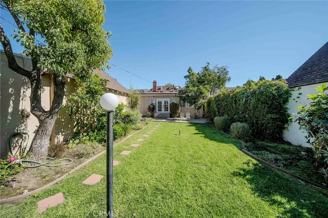 a house view with a garden space