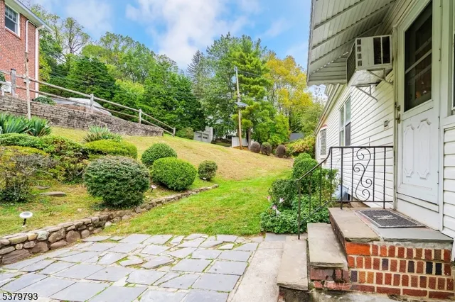 a view of a garden with pathway