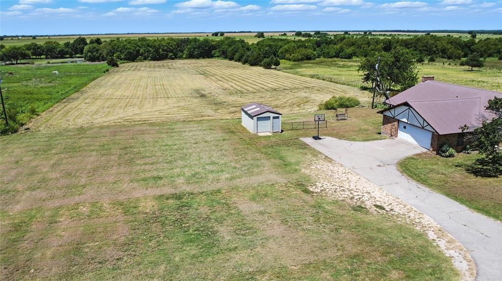 105 Greenhill Lane Cooper, TX 75432 - Photo 19 of 31 a view of an outdoor space and yard