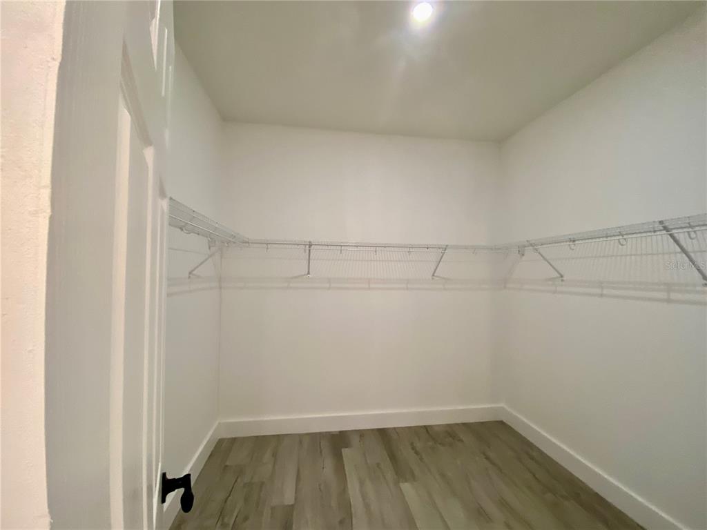 4501 Schumacher Road Sebring, FL 33872 - Photo 23 of 31 a view of a room with racks on the wall