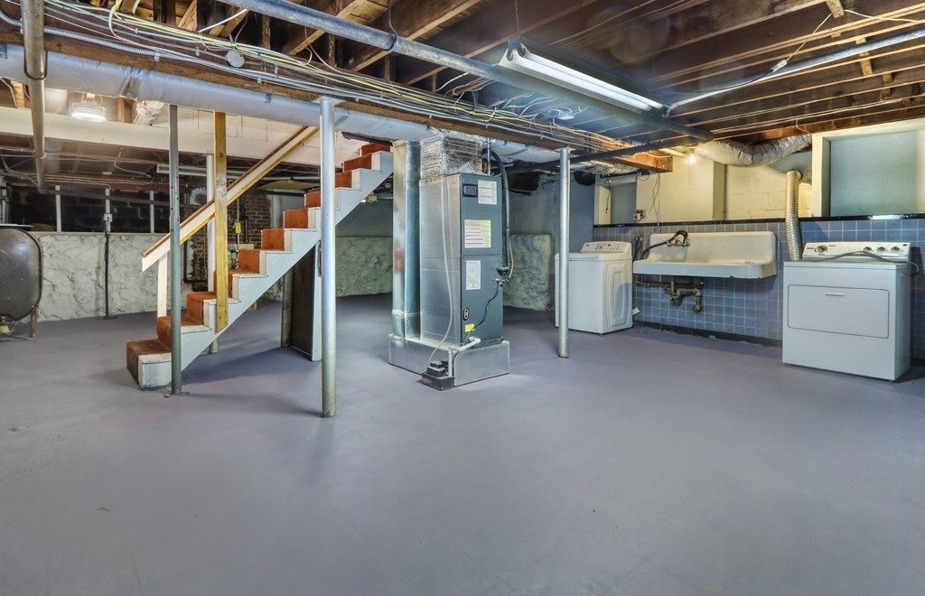 257 Lawrence Road Medford, MA 02155 - Photo 22 of 29 a view of an empty room with stairs