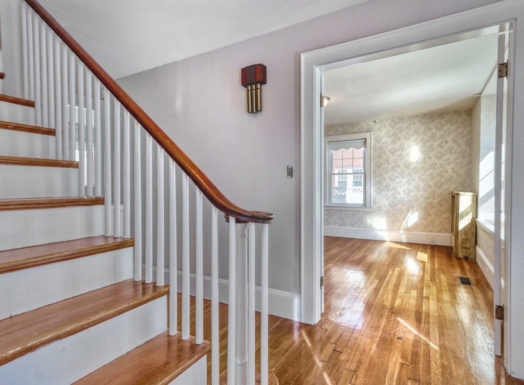 257 Lawrence Road Medford, MA 02155 - Photo 3 of 29 a view of entryway with wooden floor