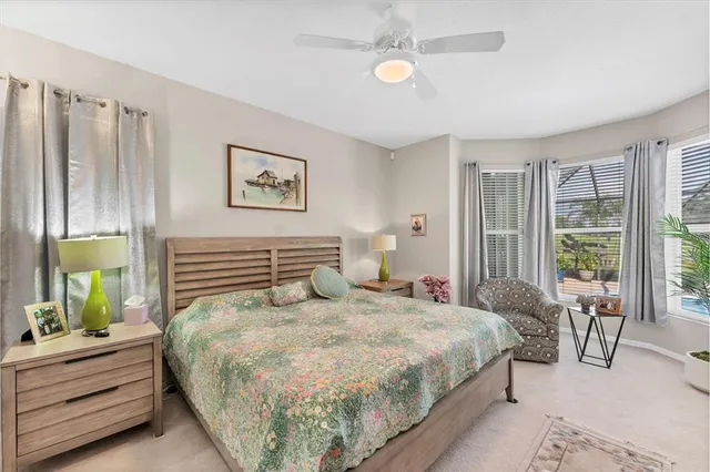 a bedroom with a bed and a couch