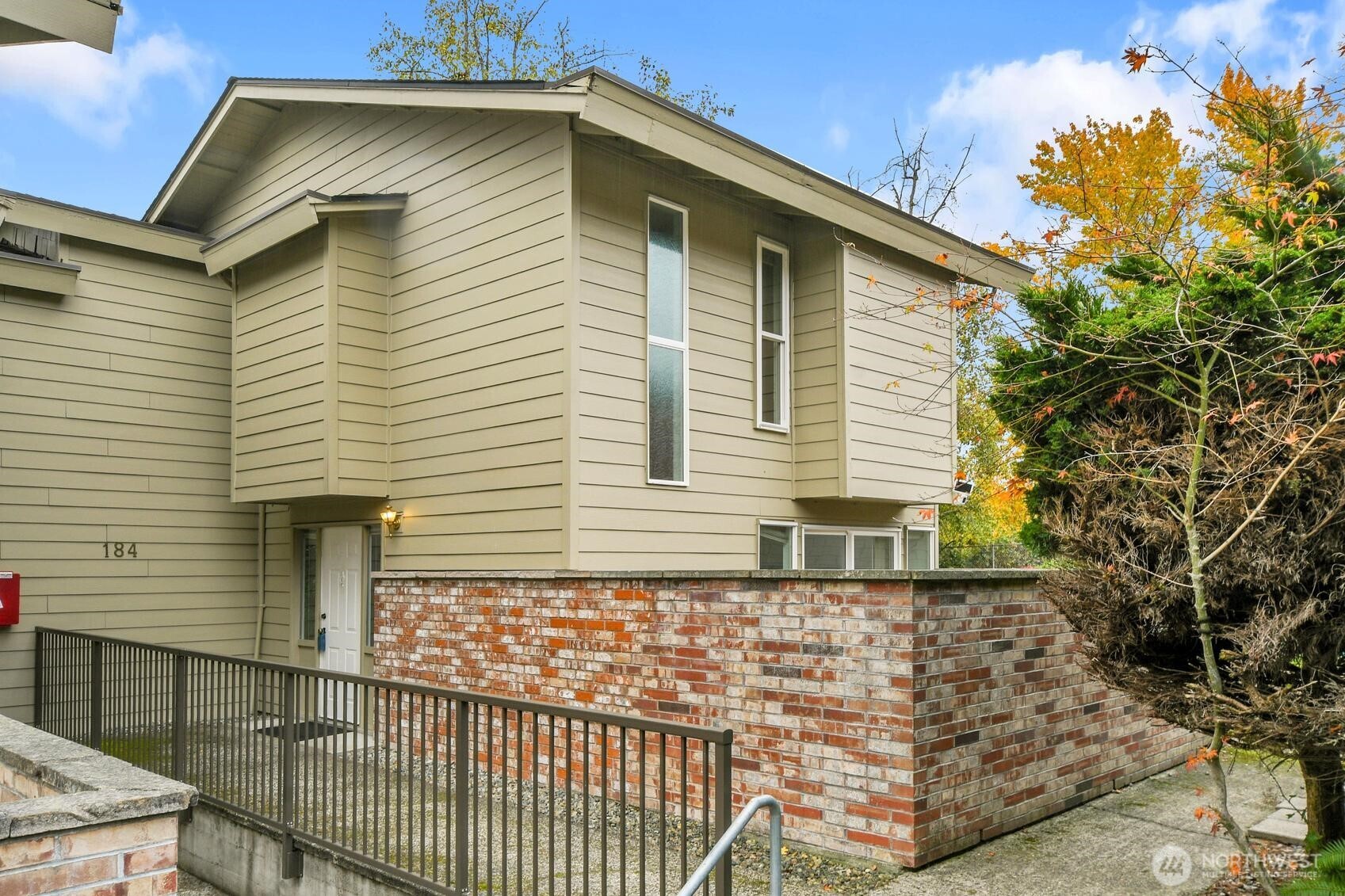 a view of a house with a yard