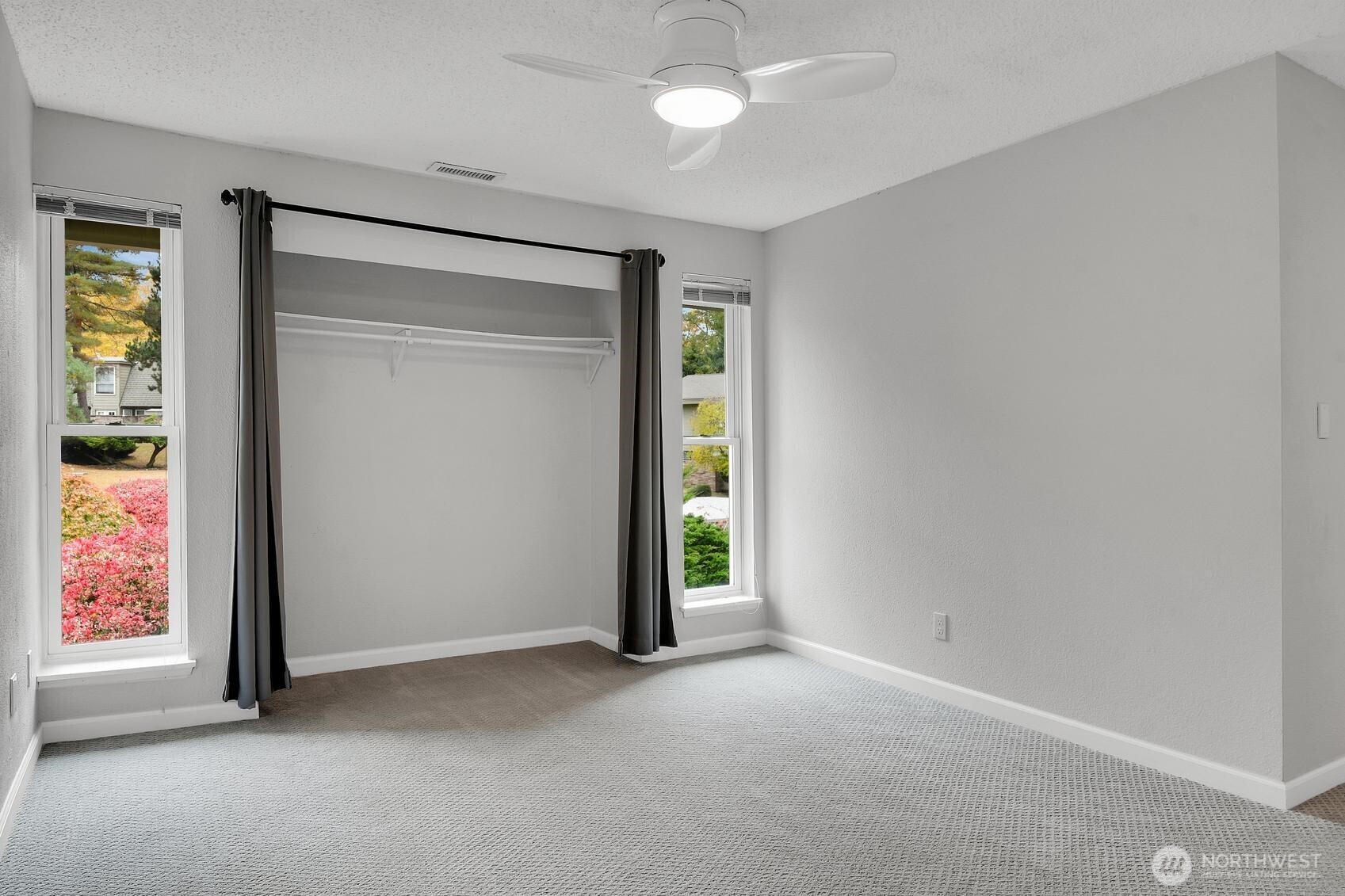 184 Southwest 200th Street Normandy Park, WA 98166 - Photo 13 of 20 an empty room with windows and closet