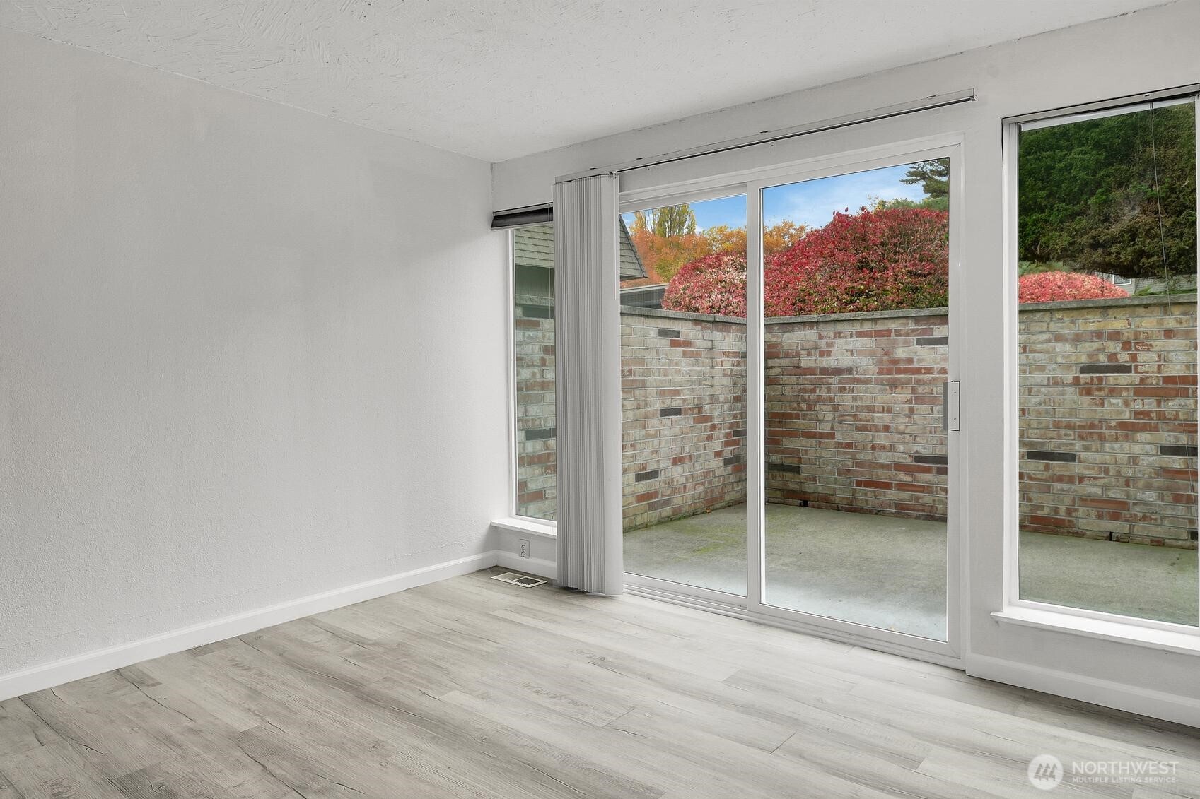184 Southwest 200th Street Normandy Park, WA 98166 - Photo 10 of 20 a view of a room with wooden floor and windows