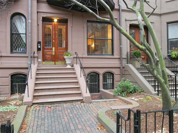 315 Beacon Street, Unit 5 Boston, MA 02116 - Photo 10 of 10 a front view of a house with a garden