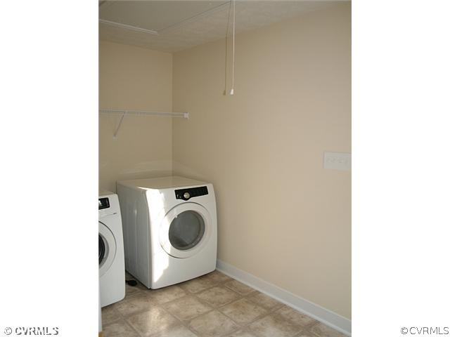 4 Winding Ridge Way Bumpass, VA 23024 - Photo 3 of 12 a utility room with dryer and washer