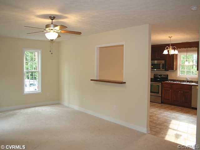 4 Winding Ridge Way Bumpass, VA 23024 - Photo 6 of 12 a view of a kitchen with a sink and dishwasher cabinets