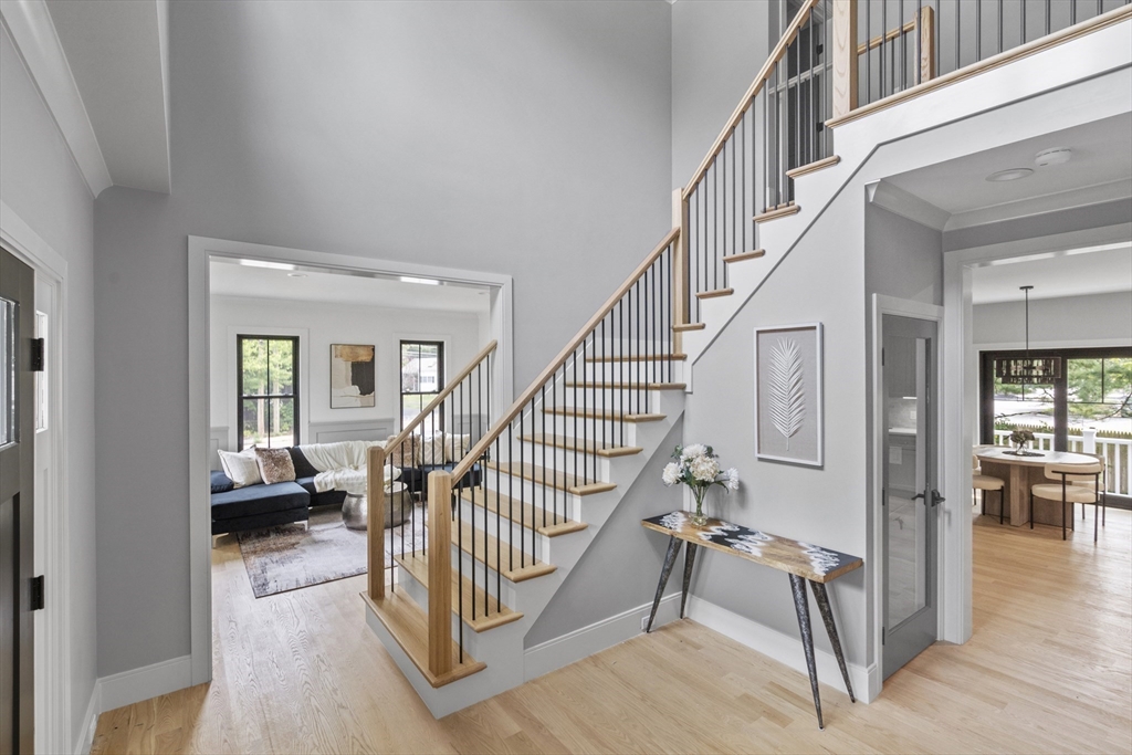 11 Avon Lane Natick, MA 01760 - Photo 2 of 21 a view of entryway and hall with wooden floor