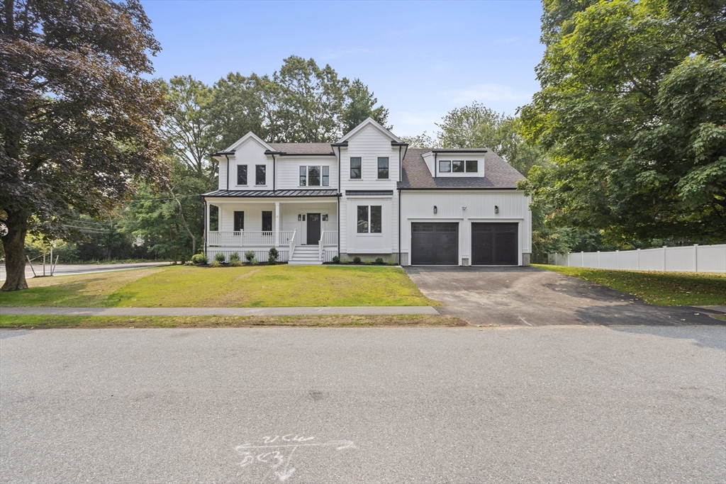 11 Avon Lane Natick, MA 01760 - Photo 4 of 21 a view of house with a swimming pool