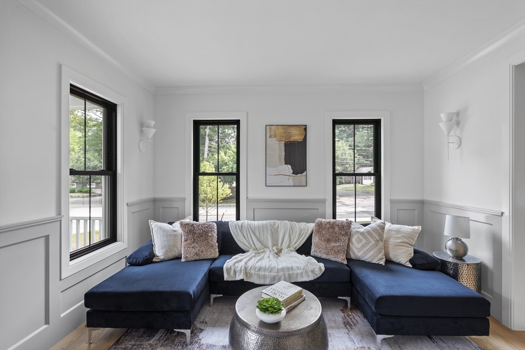 11 Avon Lane Natick, MA 01760 - Photo 7 of 21 a living room with furniture and a window