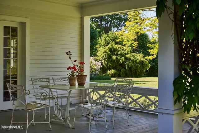 a view of a livingroom with furniture and wooden floor
