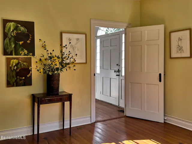 a view of livingroom with furniture and a window