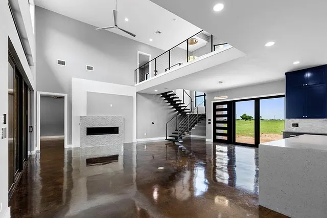 a kitchen with a sink and large window