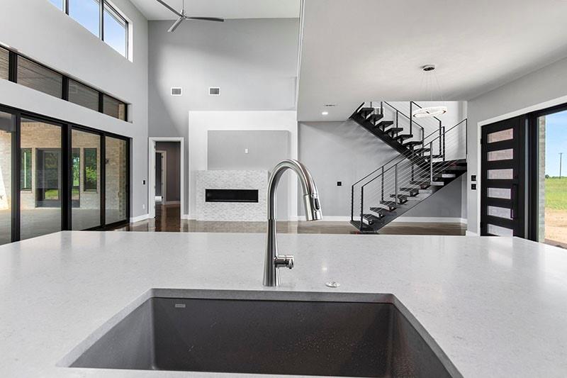 186 Martin Lane Sadler, TX 76264 - Photo 18 of 39 a kitchen with a sink and large window