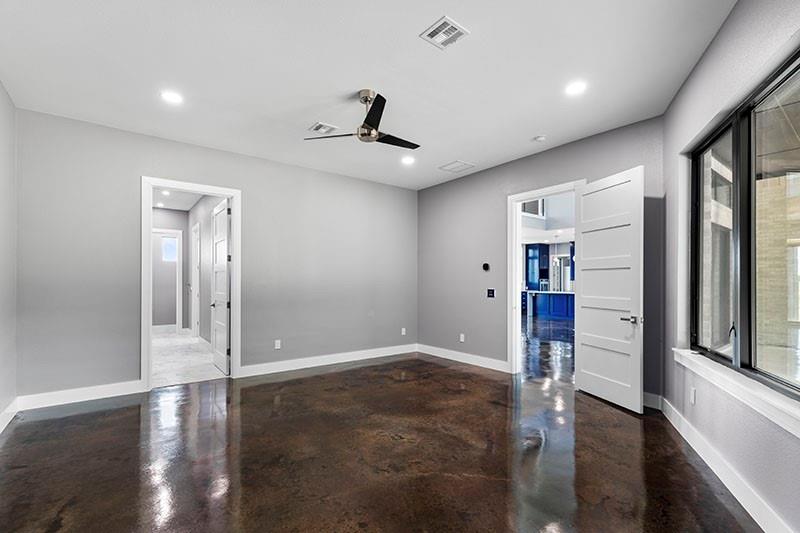 186 Martin Lane Sadler, TX 76264 - Photo 21 of 39 a view of empty room with wooden floor and window