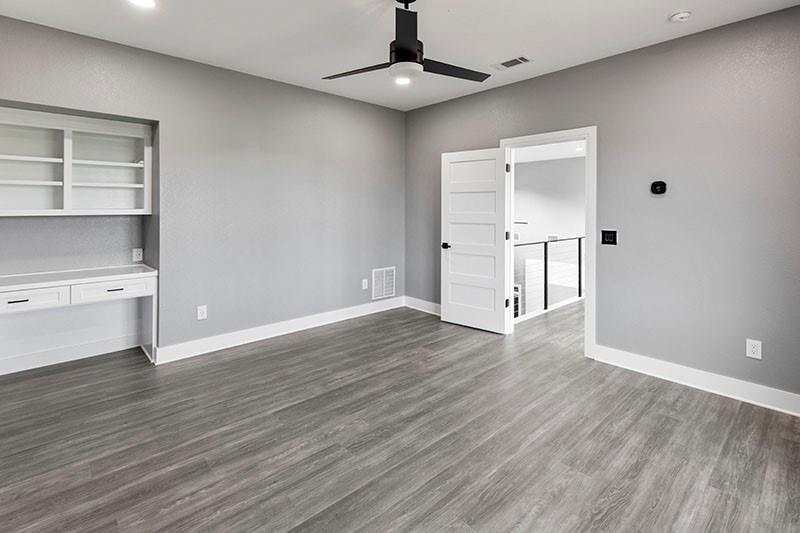 186 Martin Lane Sadler, TX 76264 - Photo 30 of 39 a view of empty room with wooden floor
