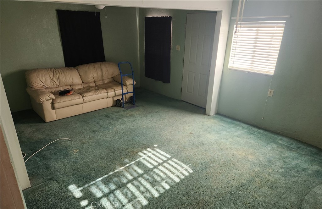 13754 Weidner Street Pacoima, CA 91331 - Photo 14 of 16 a living room with furniture