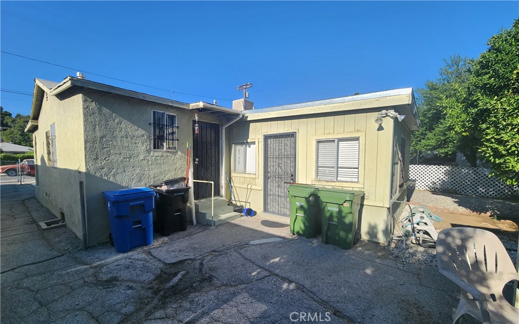 13754 Weidner Street Pacoima, CA 91331 - Photo 8 of 16 a front view of house with outdoor seating