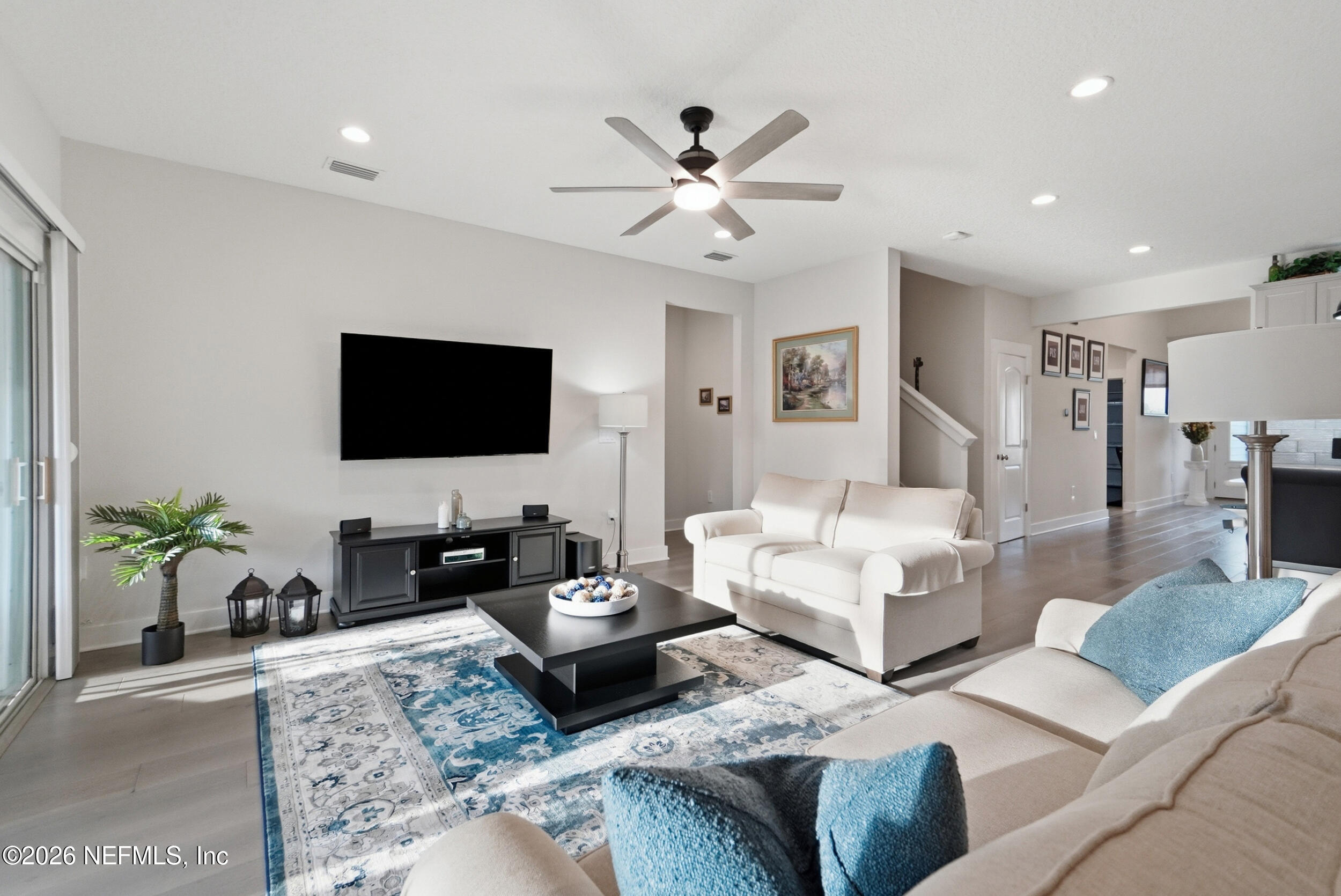 34 Red Rock Lane St. Johns, FL 32259 - Photo 20 of 71 a living room with furniture and a flat screen tv