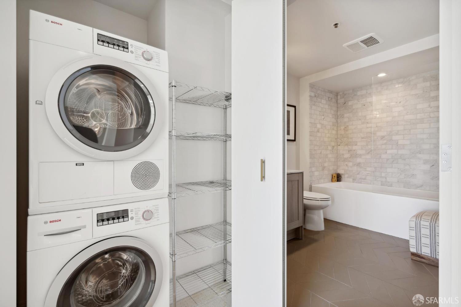 401 Harrison Street, Unit 9H San Francisco, CA 94105 - Photo 23 of 44 a view of bathroom with a washer and dryer