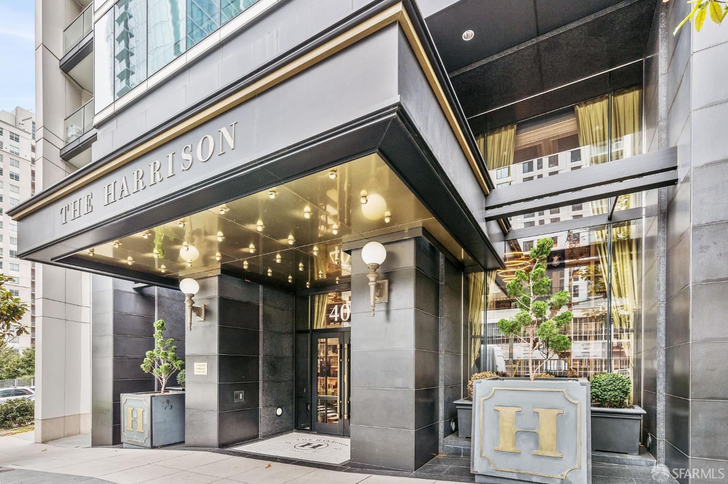 401 Harrison Street, Unit 9H San Francisco, CA 94105 - Photo 28 of 44 a view of a building with a door and glass windows