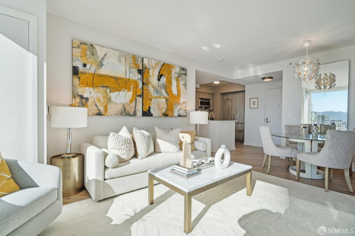 401 Harrison Street, Unit 9H San Francisco, CA 94105 - Photo 5 of 44 a living room with furniture and a painting