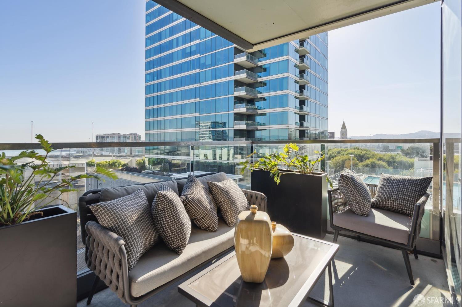 401 Harrison Street, Unit 9H San Francisco, CA 94105 - Photo 7 of 44 a view of a couches in a balcony