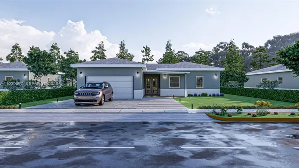 a view of house with backyard and outdoor seating