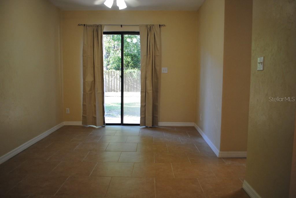 2829 Northwest 40th Place Gainesville, FL 32605 - Photo 4 of 15 a view of an empty room with a window