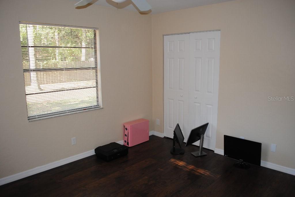 2829 Northwest 40th Place Gainesville, FL 32605 - Photo 8 of 15 a living room with furniture and a window
