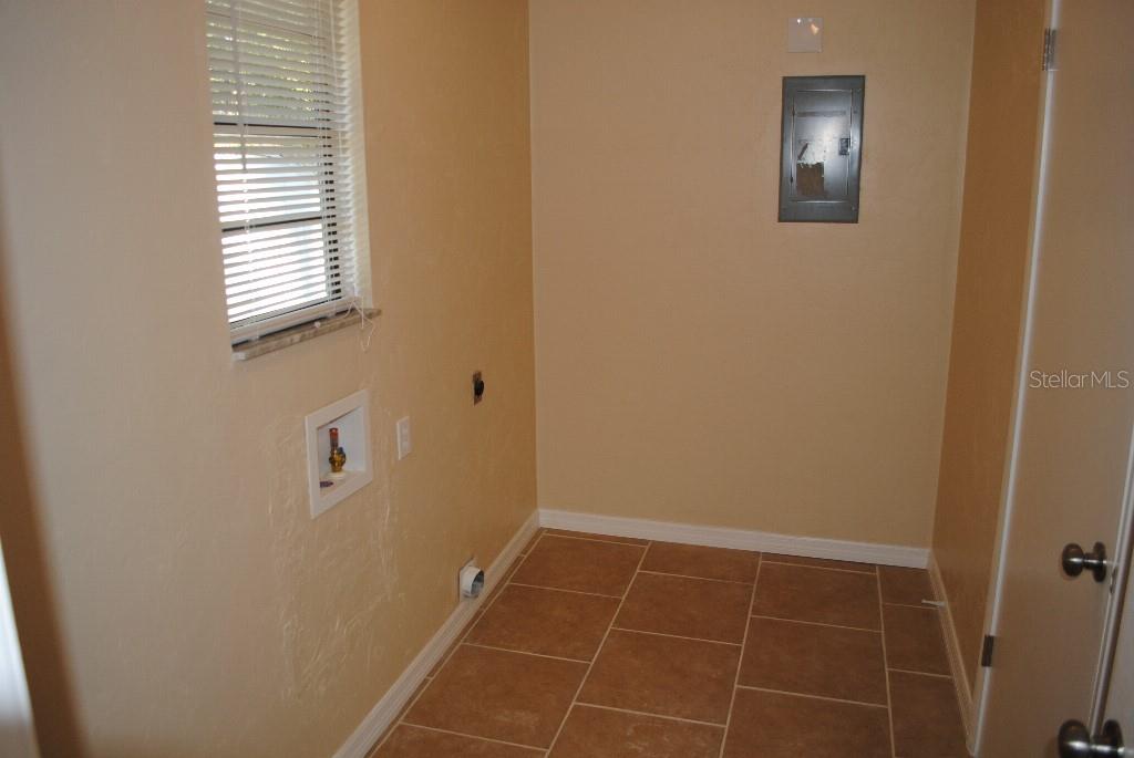 2829 Northwest 40th Place Gainesville, FL 32605 - Photo 9 of 15 a bathroom with a window