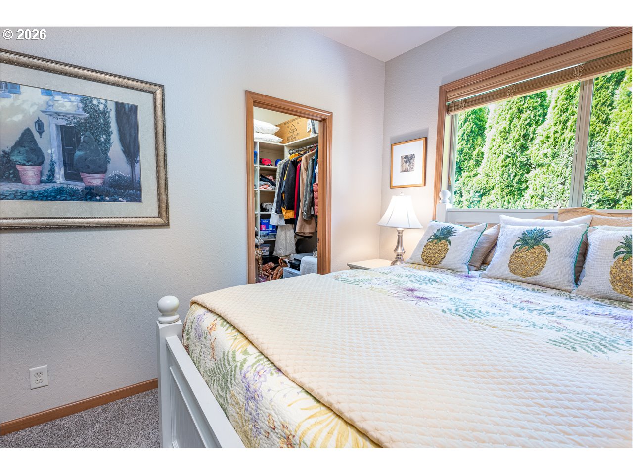 3381 Rosemont Way Eugene, OR 97401 - Photo 34 of 45 a bed sitting in a bedroom next to a window