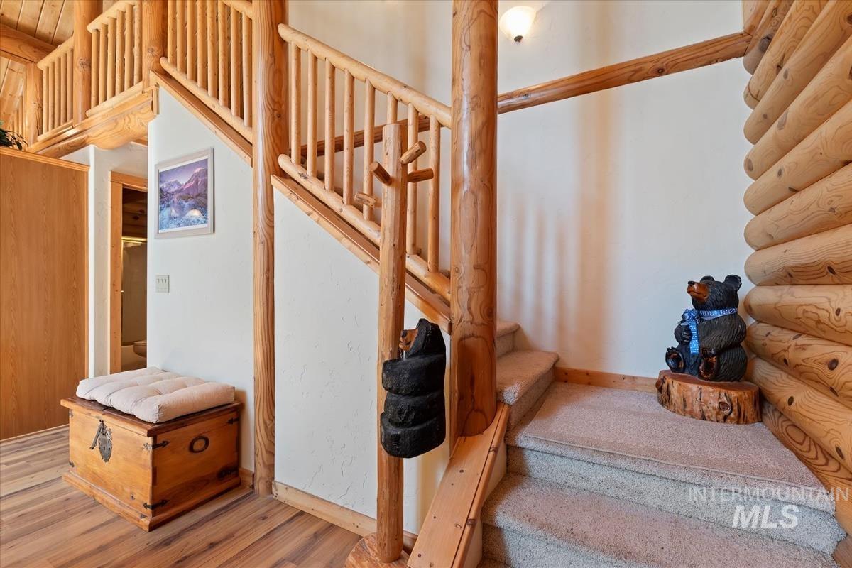 10 Elk Point Road Garden Valley, ID 83622 - Photo 25 of 42 Staircase with baseboards and wood finished floors